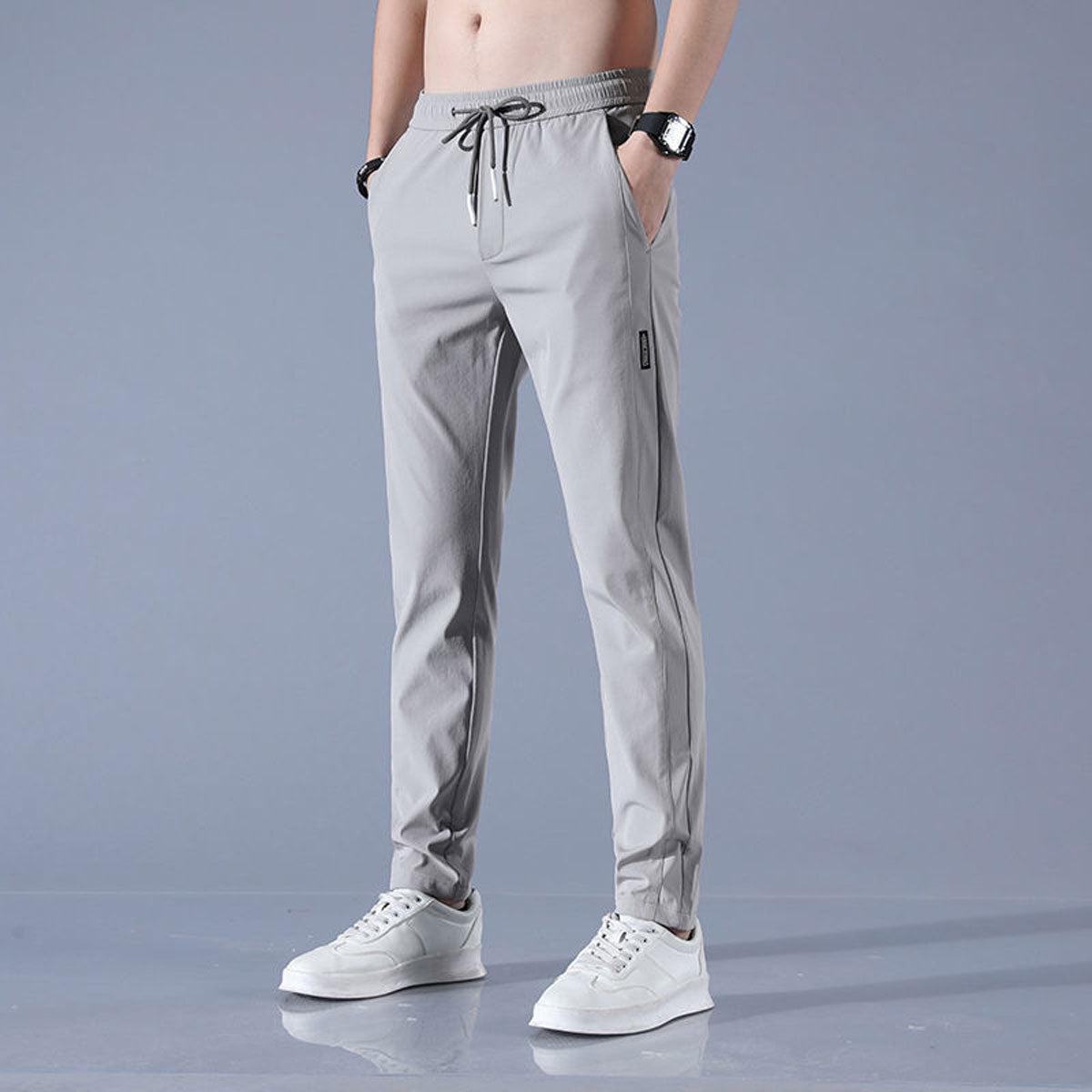 Pantaloni sportivi da uomo elasticizzati e ad asciugatura rapida, slim fit con coulisse - Grigio chiaro